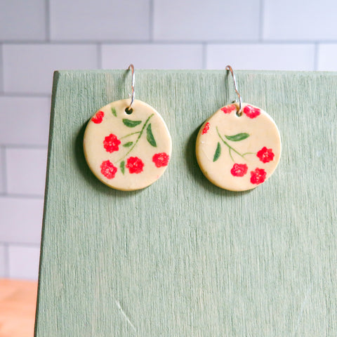 Red Blossom Earrings on Beige Clay