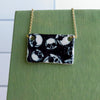 Multi Skulls Necklace in Black and White